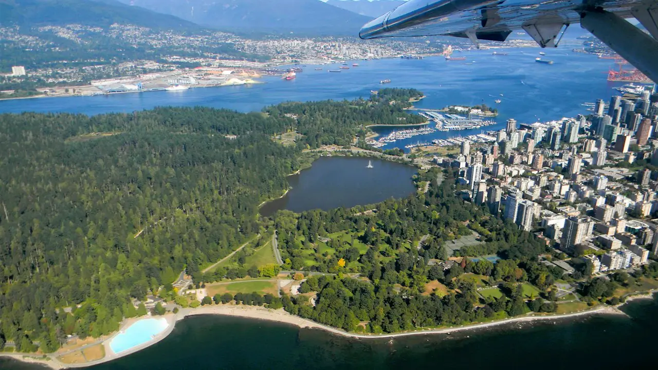 Stanley Park and downtown Vancouver seen from the air, with the harbour beyond