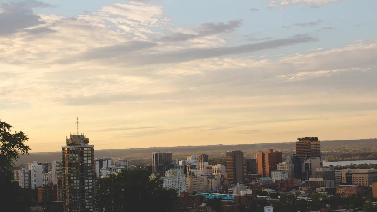 Downtown Hamilton towers under a soft evening sky