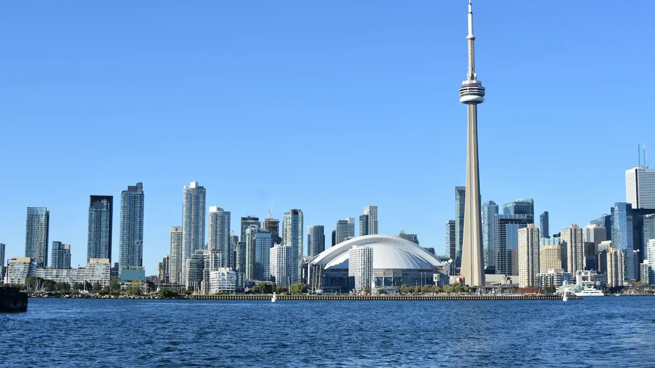The Toronto skyline and CN Tower across the harbour on a clear day