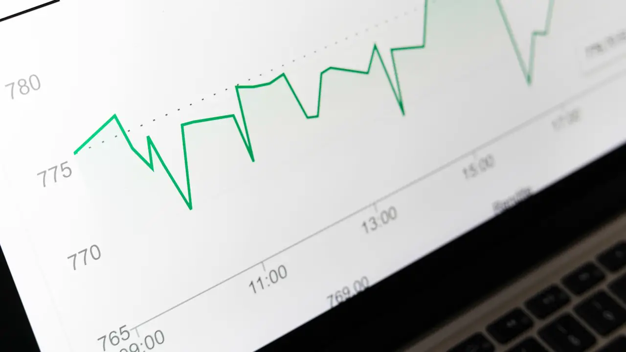 A line chart on a laptop screen showing results over time